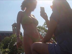 Busty girl shows off at the city fountain Picture 5