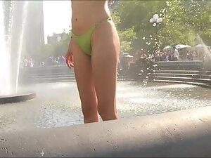 Busty girl shows off at the city fountain Picture 6