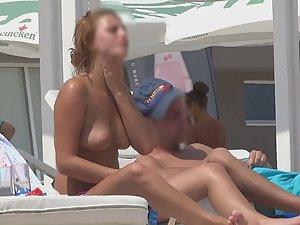 Topless girl in pink thong bikini Picture 2