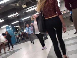 Slim blonde with messy hair is browsing the clothes store Picture 7