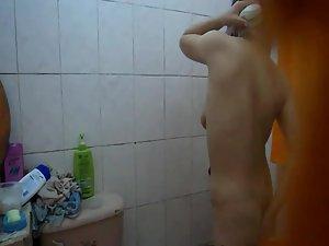 Fuckable asian girl peeped in the shower Picture 3