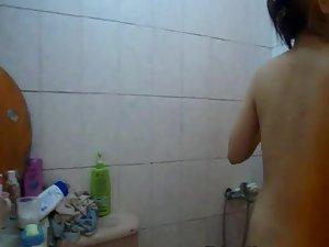 Fuckable asian girl peeped in the shower Picture 4