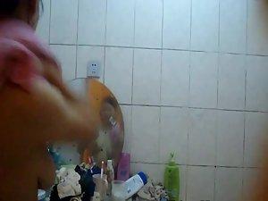 Fuckable asian girl peeped in the shower Picture 6