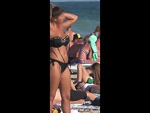 Voyeur zoom on hot cameltoe in black bikini Picture 8