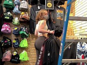 Muscular ass of a hot redhead store clerk Picture 7
