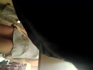 Chubby girl trying a skirt in the mall Picture 2