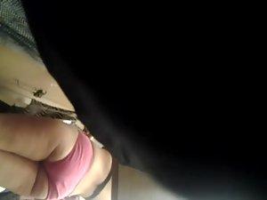 Chubby girl trying a skirt in the mall Picture 3