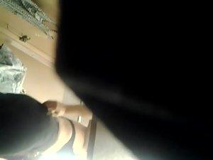 Chubby girl trying a skirt in the mall Picture 6