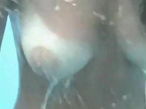 Girl with sexy tan lines under a shower Picture 5