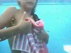 Girl with sexy tan lines under a shower Picture 6