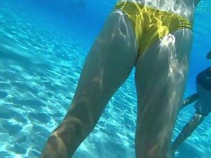 Underwater look at hairless young crotch Picture 1