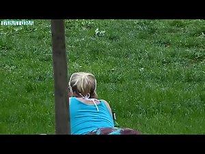 Voyeur spied her relaxing on the grass Picture 5