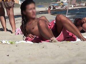 Hot nudist girl's asshole looks dark and tanned