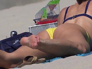 Relaxing while watching her crotch in yellow bikini Picture 8