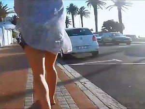 Hot girl's ass shows when she walks Picture 4