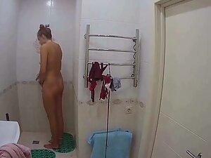 Spying on athletic girl naked in shower Picture 2