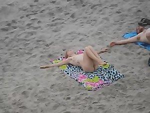 Pussy and ass open up during yoga on nudist beach Picture 2