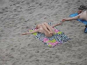 Pussy and ass open up during yoga on nudist beach Picture 4