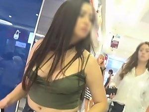 Tits look like they'll spill out of her tiny top
