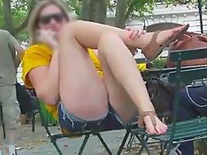 Giggling woman spreads her legs for us Picture 1