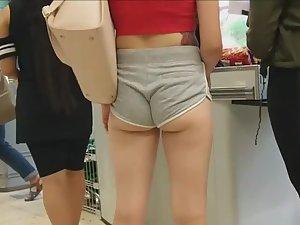 Tight little ass crack swallows shorts