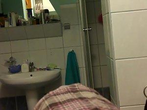 Spying on hot housewife in her bathroom Picture 2