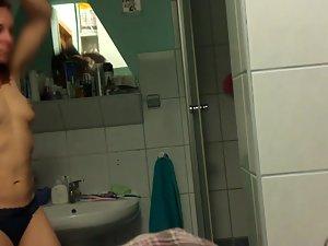 Spying on hot housewife in her bathroom Picture 6