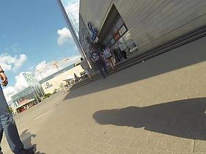 Upskirt while she carries a suitcase Picture 5