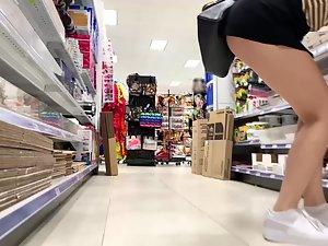 Hot view when she bends over in store Picture 2