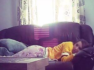 Hidden cam caught her rub pussy in living room Picture 1