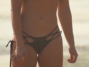 Blonde in sexy bikini enjoys the beach with boyfriend Picture 1