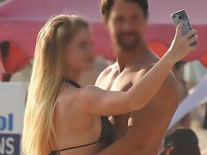 Blonde in sexy bikini enjoys the beach with boyfriend Picture 5