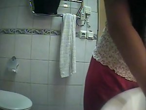 Hidden cam caught a teen girl pee Picture 6