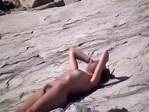 Sexy brunette spied on a beach Picture 7