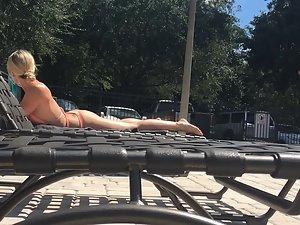 Peeping on astonishing blonde suntanning by the pool Picture 4