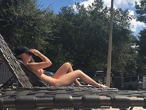 Peeping on astonishing blonde suntanning by the pool Picture 8