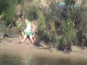 Spying on sex from across the river