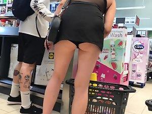 Bending over at cashier line exposes her upskirt Picture 6