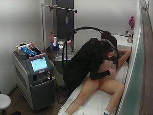 Busty blonde spied while she gets hair removal treatment Picture 3