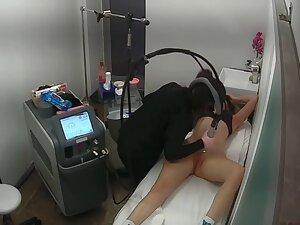 Busty blonde spied while she gets hair removal treatment Picture 4