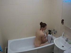 Petite girl spied while showering in bathroom Picture 6