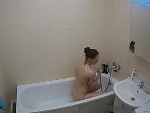 Petite girl spied while showering in bathroom Picture 6