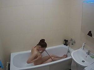 Petite girl spied while showering in bathroom Picture 7