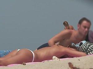 Lovable topless girl on beach Picture 2