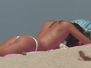Lovable topless girl on beach Picture 3