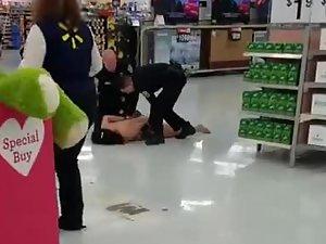 Security takes naked woman out of big store