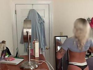 Spying on stunning girl getting dressed at home Picture 7
