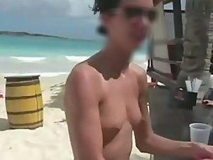 Sweet fake boobs on a beach