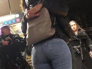 Checking out ass in jeans during a kiss