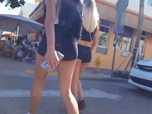 Stunning asses of girls passing flyers on street Picture 8